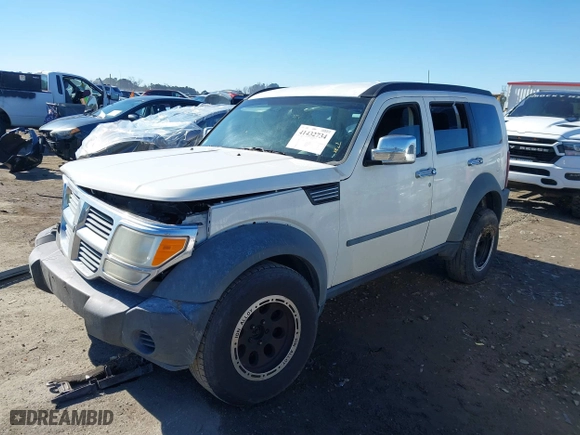 2008 Dodge Nitro SXT with VIN 1D8GU28K28W114449, listed as a IAAI auction lot 41432734 with 246,362 mi miles. Bid and sale history available at carsss.com. Image 16.