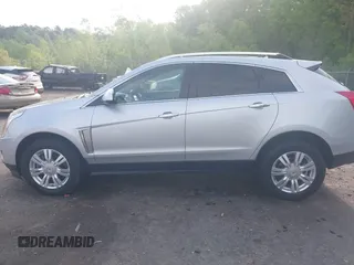 2015 Cadillac SRX Luxury Collection with VIN 3GYFNBE3XFS612048, listed as a IAAI auction lot 41923525 with 154,621 mi miles. Bid and sale history available at carsss.com. Image 14.