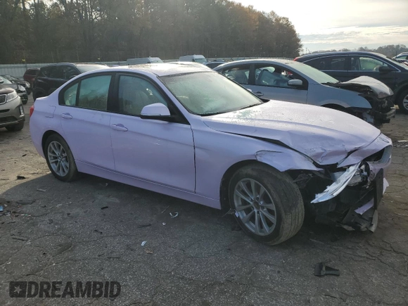 2018 BMW 3 Series 320i with VIN WBA8A9C55JAH12818, listed as a Copart auction lot 52110515 with 72,522 mi miles and Salvage title. Bid and sale history available at DreamBid. Image 4.