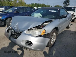 2004 Chrysler Sebring GTC z VIN 1C3EL75R24N184982, wystawiony jako Copart lot #70210223 z przebiegiem Nie podano mil oraz Szkoda całkowita • Salvage title. Historia ofert i sprzedaży dostępna na DreamBid. Obrazek 1.