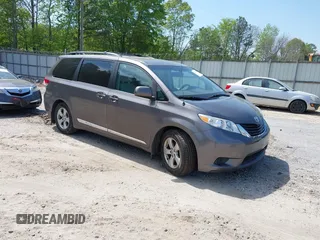 2014 Toyota Sienna LE AAS with VIN 5TDKK3DC4ES431664, listed as a IAAI auction lot 42081429 with 208,505 mi miles. Bid and sale history available at carsss.com. Image 1.