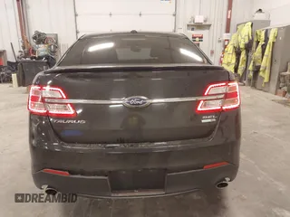 2015 Ford Taurus SEL with VIN 1FAHP2H80FG133240, listed as a IAAI auction lot 41897873 with 189,059 mi miles. Bid and sale history available at carsss.com. Image 16.