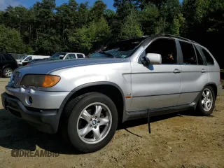 2001 BMW X5 4.4i with VIN WBAFB33581LH13564, listed as a Copart auction lot 74357004 with 0 mi miles and Salvage Title. Bid and sale history available at carsss.com. Image 1.