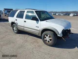 2001 Oldsmobile Bravada with VIN 1GHDT13W512107415, listed as a IAAI auction lot 41678324 with 256,968 mi miles. Bid and sale history available at carsss.com. Image 1.