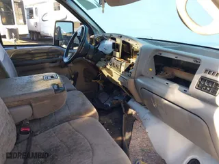 1999 Ford Super Duty F-350 SRW XL with VIN 1FTSW31F0XEE53396, listed as a IAAI auction lot 41383093 with 307,697 mi miles. Bid and sale history available at carsss.com. Image 5.