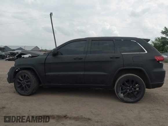 2020 Jeep Grand Cherokee Laredo E with VIN 1C4RJFAG2LC326761, listed as a IAAI auction lot 42434904 with 88,556 mi miles and . Bid and sale history available at DreamBid. Image 14.
