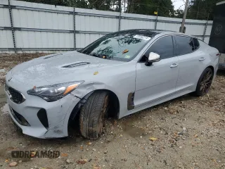 2021 Kia Stinger GT2 with VIN KNAE55LC2M6087846, listed as a Copart auction lot 73556274 with 59,168 mi miles and Salvage Title. Bid and sale history available at carsss.com. Image 1.