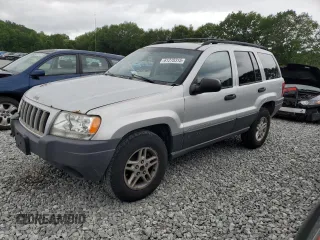 2004 Jeep Grand Cherokee Laredo z VIN 1J4GW48S44C203546, wystawiony jako Copart lot #61270315 z przebiegiem 161 534 mil mil oraz Czysty tytuł • Clean title. Historia ofert i sprzedaży dostępna na DreamBid. Obrazek 1.