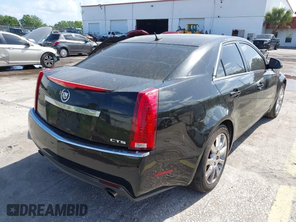 2008 Cadillac CTS RWD w/1SA with VIN 1G6DJ577180141687, listed as a IAAI auction lot 41999393 with 323,361 mi miles. Bid and sale history available at carsss.com. Image 4.