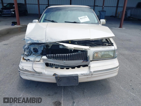 1996 Lincoln Town Car Cartier with VIN 1LNLM83W7TY634343, listed as a IAAI auction lot 42474123 with 193,705 mi miles and . Bid and sale history available at DreamBid. Image 12.