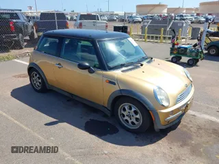 2004 MINI Hardtop with VIN WMWRC33474TC48930, listed as a IAAI auction lot 41657936 with 147,422 mi miles and . Bid and sale history available at DreamBid. Image 1.