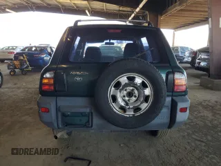 1999 Toyota RAV4 with VIN JT3GP10V6X0040870, listed as a Copart auction lot 51676855 with 215,782 mi miles and Clean Title. Bid and sale history available at DreamBid. Image 6.