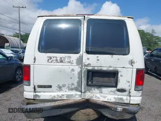 2005 Ford Econoline Cargo with VIN 1FTNE24W55HA43243, listed as a IAAI auction lot 41528626 with 240,685 mi miles and . Bid and sale history available at carsss.com. Image 16.
