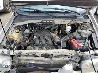 2005 Ford Escape Limited with VIN 1FMCU94165KA11181, listed as a Copart auction lot 62880725 with 180,152 mi miles and Salvage title. Bid and sale history available at DreamBid. Image 12.
