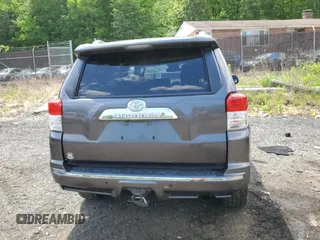 2011 Toyota 4Runner Trail with VIN JTEBU5JR4B5041806, listed as a Copart auction lot 55930015 with 149,697 mi miles and Salvage title. Bid and sale history available at DreamBid. Image 6.