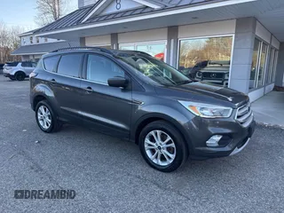 2018 Ford Escape SE with VIN 1FMCU9GD8JUA76991, listed as a IAAI auction lot 42013849 with 213,827 mi miles. Bid and sale history available at carsss.com. Image 1.