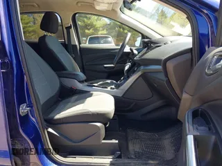 2016 Ford Escape SE with VIN 1FMCU9GX1GUB28870, listed as a IAAI auction lot 42129628 with 113,909 mi miles. Bid and sale history available at carsss.com. Image 5.