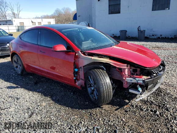 2022 Tesla Model 3 with VIN 5YJ3E1EA5NF184785, listed as a Copart auction lot 49466575 with 85,273 mi miles and Salvage Title. Bid and sale history available at DreamBid. Image 4.