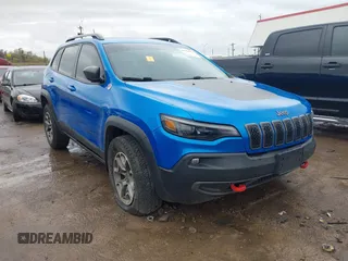 2020 Jeep Cherokee Trailhawk z VIN 1C4PJMBX4LD588320, wystawiony jako IAAI lot #41953654 z przebiegiem 50 623 mil mil oraz . Historia ofert i sprzedaży dostępna na DreamBid. Obrazek 1.