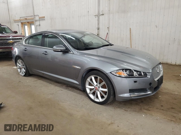 2015 Jaguar XF Portfolio with VIN SAJWJ0FF8F8U65883, listed as a Copart auction lot 55783945 with 133,431 mi miles and Salvage Title. Bid and sale history available at DreamBid. Image 4.