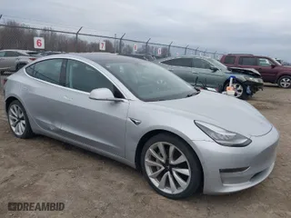 2018 Tesla Model 3 Long Range Battery with VIN 5YJ3E1EBXJF116906, listed as a IAAI auction lot 41913259 with 117,740 mi miles. Bid and sale history available at carsss.com. Image 1.