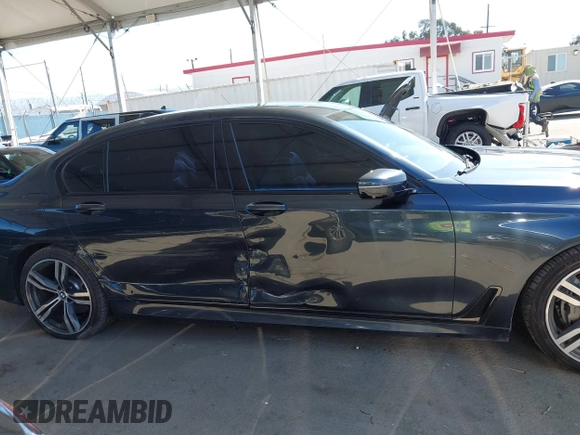 2019 BMW 7 Series 740i with VIN WBA7E2C53KB218375, listed as a IAAI auction lot 42008827 with 61,337 mi miles and . Bid and sale history available at DreamBid. Image 13.