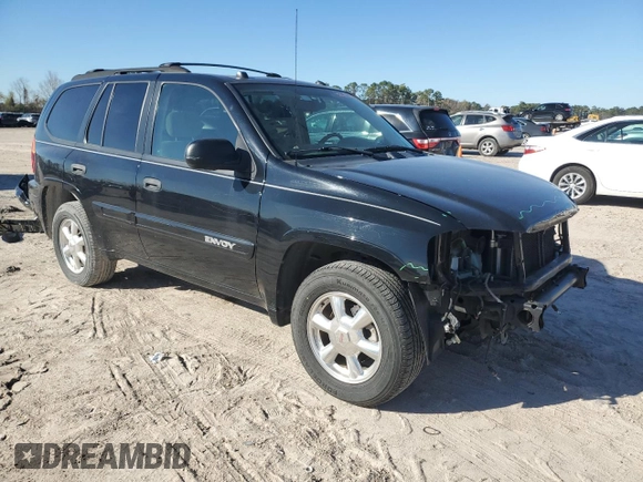 2005 GMC Envoy SLT with VIN 1GKDS13S352297652, listed as a Copart auction lot 41614205 with 71,937 mi miles and Salvage Title. Bid and sale history available at carsss.com. Image 4.