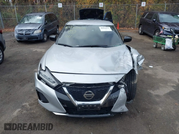 2020 Nissan Maxima S z VIN 1N4AA6BV9LC383538, wystawiony jako IAAI lot #40860829 z przebiegiem 63 975 mil mil oraz . Historia ofert i sprzedaży dostępna na DreamBid. Obrazek 13.