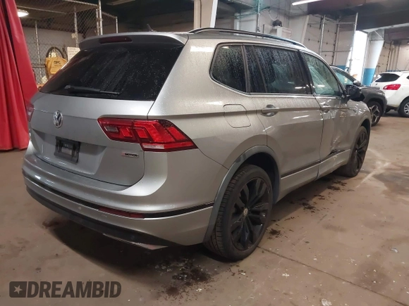 2020 Volkswagen Tiguan SE with VIN 3VV2B7AX5LM149305, listed as a IAAI auction lot 41920685 with 30,512 mi miles and . Bid and sale history available at DreamBid. Image 4.