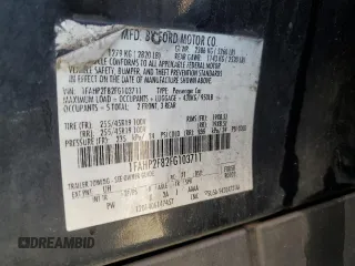 2015 Ford Taurus Limited z VIN 1FAHP2F82FG103711, wystawiony jako Copart lot #57158265 z przebiegiem 205 999 mil mil oraz Szkoda całkowita • Salvage title. Historia ofert i sprzedaży dostępna na DreamBid. Obrazek 12.
