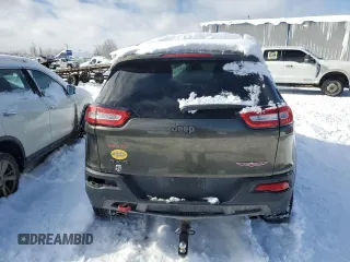2014 Jeep Cherokee Trailhawk with VIN 1C4PJMBS2EW310818, listed as a Copart auction lot 44581755 with 105,560 mi miles and Non repairable. Bid and sale history available at DreamBid. Image 6.