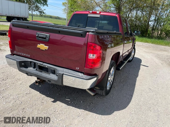 2013 Chevrolet Silverado 1500 LT with VIN 3GCPKSE77DG105677, listed as a Copart auction lot 56706005 with 152,677 mi miles and Clean Title. Bid and sale history available at DreamBid. Image 4.
