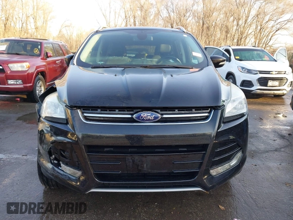 2014 Ford Escape Titanium with VIN 1FMCU0JX0EUC21512, listed as a IAAI auction lot 41781026 with 142,771 mi miles. Bid and sale history available at carsss.com. Image 12.