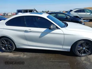 2016 BMW 2 Series M235i with VIN WBA1J7C5XGV359562, listed as a IAAI auction lot 39990299 with 54,022 mi miles. Bid and sale history available at carsss.com. Image 13.