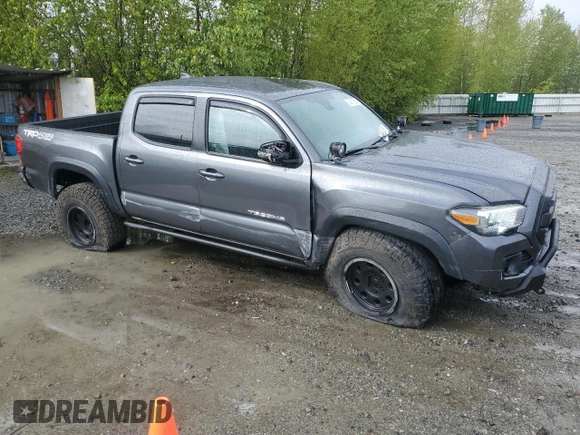 2019 Toyota Tacoma SR with VIN 3TMCZ5AN7KM237563, listed as a Copart auction lot 53919355 with 65,392 mi miles and Salvage title. Bid and sale history available at DreamBid. Image 4.