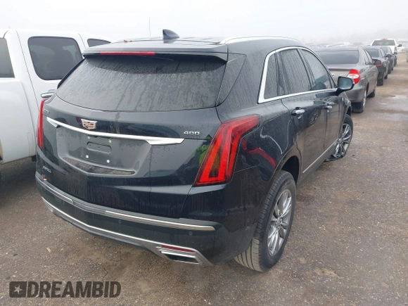 2021 Cadillac XT5 FWD Premium Luxury with VIN 1GYKNCRS2MZ185678, listed as a IAAI auction lot 41143084 with 25,399 mi miles and . Bid and sale history available at carsss.com. Image 4.
