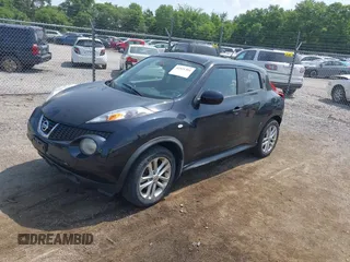 2013 Nissan Juke SL z VIN JN8AF5MV0DT214386, wystawiony jako IAAI lot #42521301 z przebiegiem 145 893 mil mil oraz . Historia ofert i sprzedaży dostępna na DreamBid. Obrazek 2.