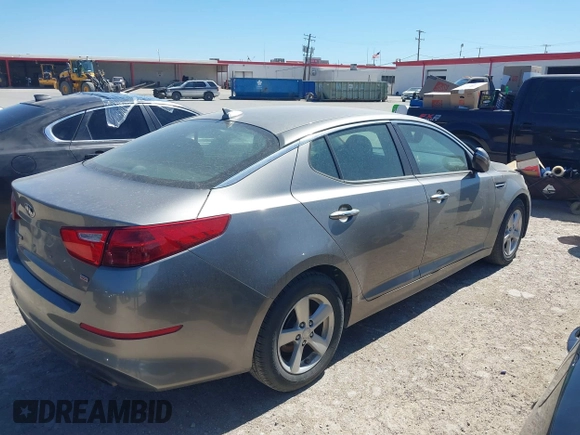 2015 Kia Optima LX z VIN 5XXGM4A70FG463799, wystawiony jako IAAI lot #41815630 z przebiegiem 175 637 mil mil oraz . Historia ofert i sprzedaży dostępna na DreamBid. Obrazek 4.