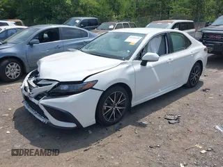 2023 Toyota Camry SE with VIN 4T1G11AK3PU784979, listed as a IAAI auction lot 42152149 with 49,070 mi miles. Bid and sale history available at carsss.com. Image 2.