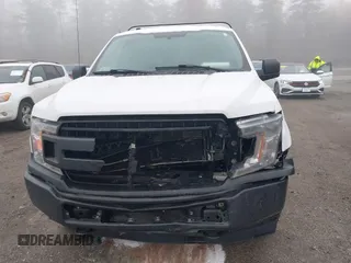 2018 Ford F-150 XL with VIN 1FTMF1EB1JKE19030, listed as a IAAI auction lot 42233745 with 193,352 mi miles and . Bid and sale history available at DreamBid. Image 6.