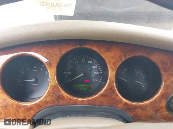 1999 Jaguar XJ with VIN SAJKD6048XC869099, listed as a IAAI auction lot 42761055 with 124,326 mi miles and . Bid and sale history available at DreamBid. Image 7.