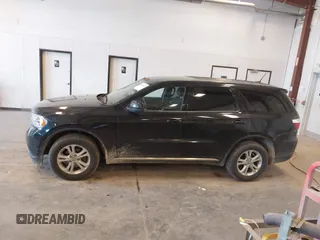 2013 Dodge Durango SXT with VIN 1C4RDJAG1DC681416, listed as a IAAI auction lot 42390313 with 222,022 mi miles and . Bid and sale history available at DreamBid. Image 14.