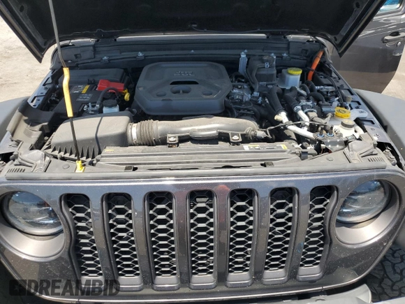 2023 Jeep Wrangler Rubicon z VIN 1C4JJXR65PW557849, wystawiony jako Copart lot #57845705 z przebiegiem 21 849 mil mil oraz Szkoda całkowita • Salvage title. Historia ofert i sprzedaży dostępna na DreamBid. Obrazek 11.