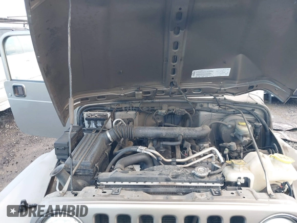 2004 Jeep Wrangler Sport with VIN 1J4FA49S94P711531, listed as a IAAI auction lot 41306863 with 143,720 mi miles and . Bid and sale history available at DreamBid. Image 10.