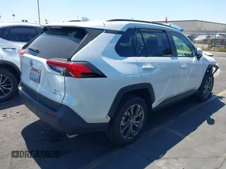 2023 Toyota RAV4 Hybrid XLE Premium with VIN JTMB6RFV0PD087237, listed as a IAAI auction lot 42606802 with 16,872 mi miles and . Bid and sale history available at DreamBid. Image 4.