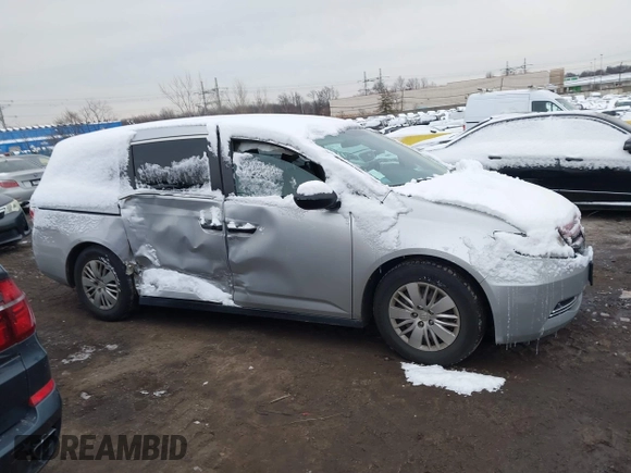 2014 Honda Odyssey LX with VIN 5FNRL5H22EB080346, listed as a IAAI auction lot 41282783 with 101,000 mi miles and . Bid and sale history available at carsss.com. Image 13.