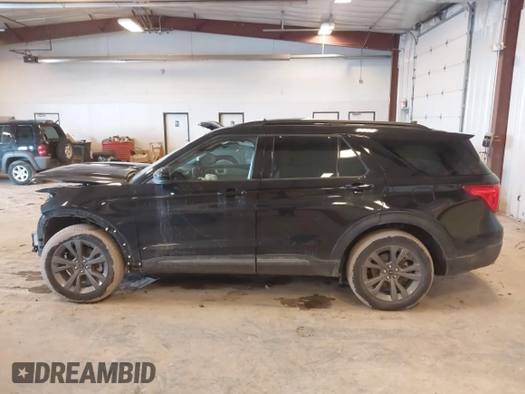 2022 Ford Explorer XLT with VIN 1FMSK8DH8NGB51521, listed as a IAAI auction lot 41683631 with 24,405 mi miles. Bid and sale history available at carsss.com. Image 14.