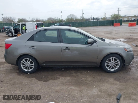 2012 Kia Forte EX with VIN KNAFU4A24C5632655, listed as a IAAI auction lot 41932379 with 146,273 mi miles. Bid and sale history available at carsss.com. Image 14.
