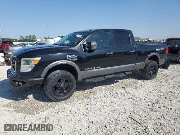 2016 Nissan Titan SL z VIN 1N6BA1F4XGN509402, wystawiony jako Copart lot #52410795 z przebiegiem 37 421 mil mil oraz Szkoda całkowita • Salvage title. Historia ofert i sprzedaży dostępna na DreamBid. Obrazek 1.