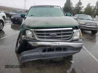 2000 Ford F-150 XL with VIN 1FTZX1726YKA88021, listed as a Copart auction lot 44424675 with 0 mi miles and Salvage Title. Bid and sale history available at carsss.com. Image 5.